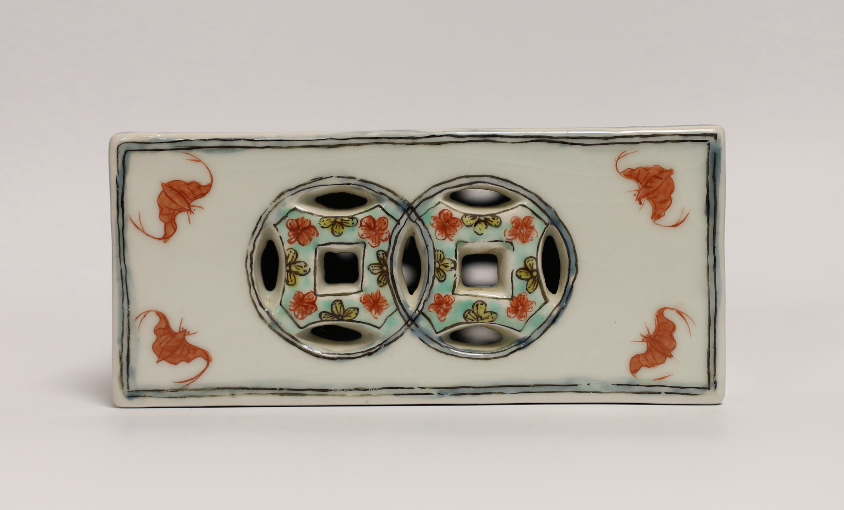 A Chinese famille verte pillow, 20cm high